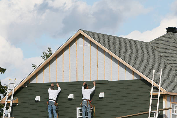 Professional Siding Replacement technician working in Shacklefords, VA